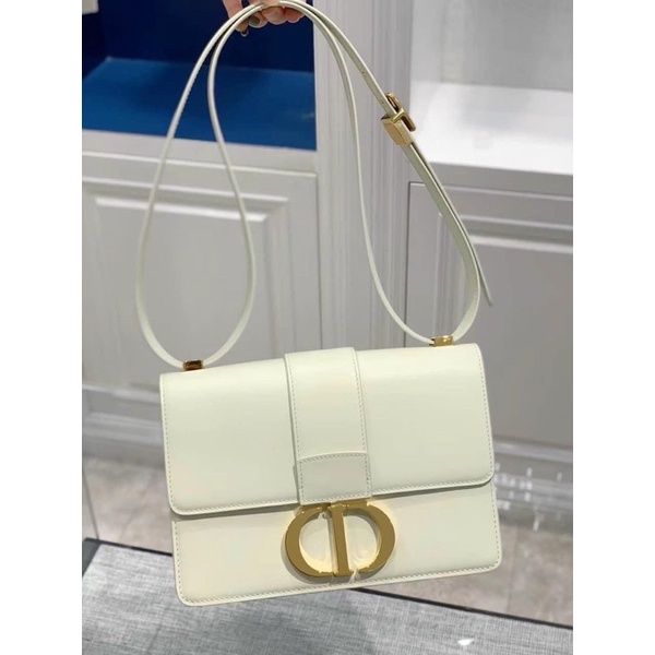 Túi trắng khoá vàng da trơn