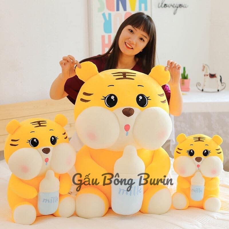 Gấu bông ôm bình sữa, heo bông ôm bình sữa, hổ ôm bình sữa