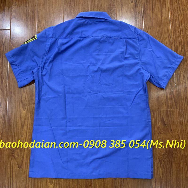 Áo bảo vệ ngắn tay màu xanh đậm vải kate Mỹ thấm hút mồ hôi