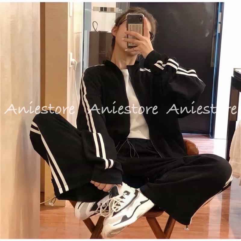 Bộ Nỉ Thể Thao Đen Kẻ Sọc Dài Tay Khóa Kéo Unisex Dáng Rộng