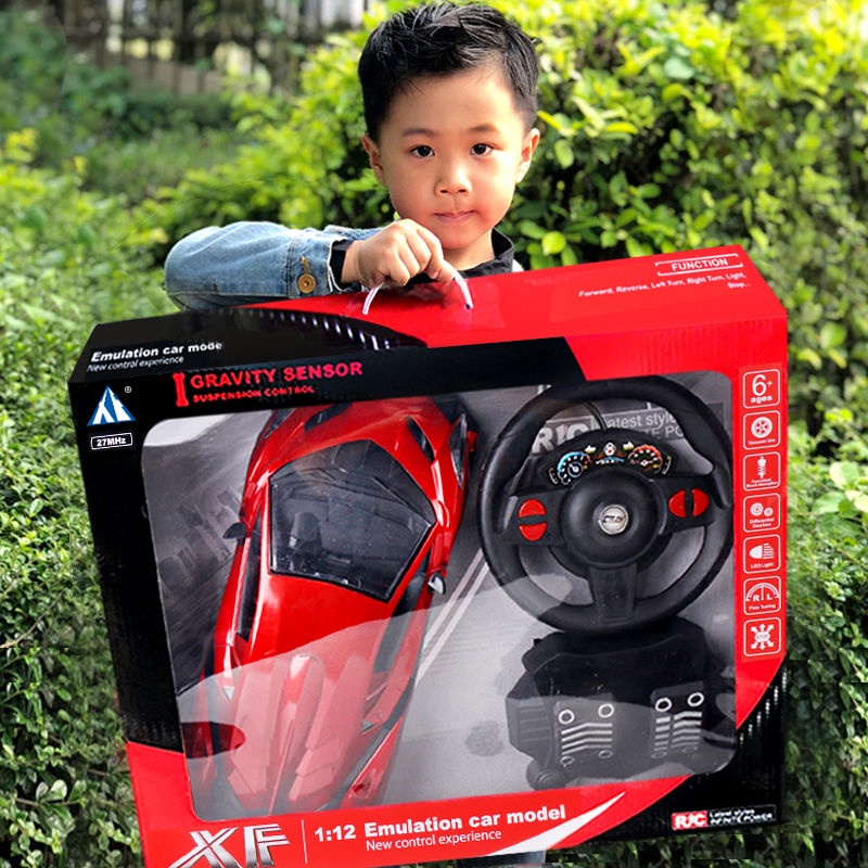 YĐồ chơi ô tô điều khiển từ xa Vô lăng có thể sạc lại Cảm biến trọng lực Trôi tốc độ cao trẻ em Lamborghini thao