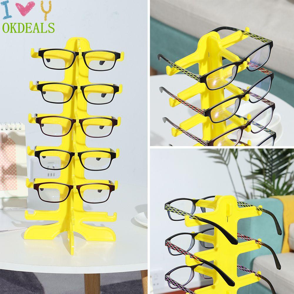 Giá đỡ trưng bày mắt kính nhựa nhiều màu tiết kiệm không gian