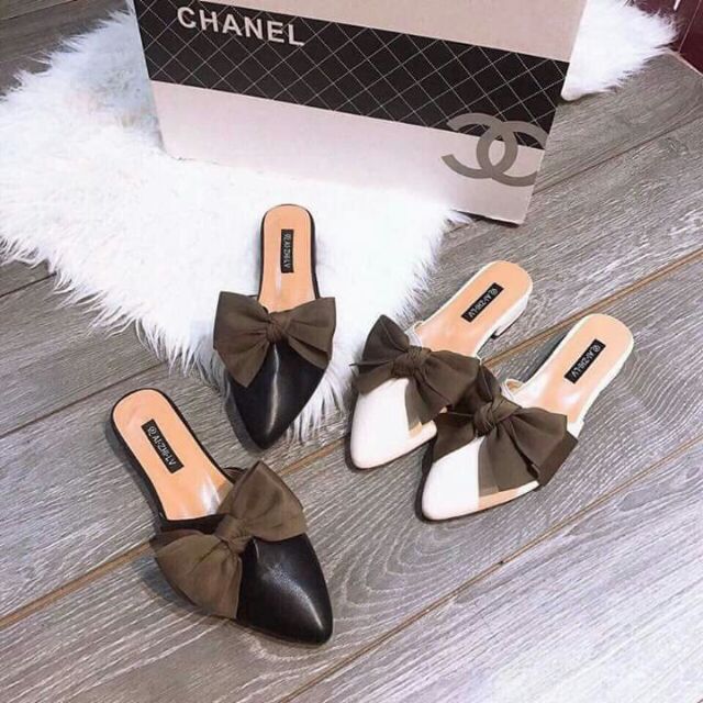 Sục nơ đen trắng