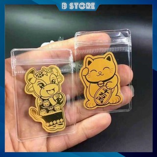Mèo thần tài và Trâu vàng năm Tân Sửu, Mèo mạ vàng gắn điện thoại iphone mang lại may mắn, lộc tài cho năm mới