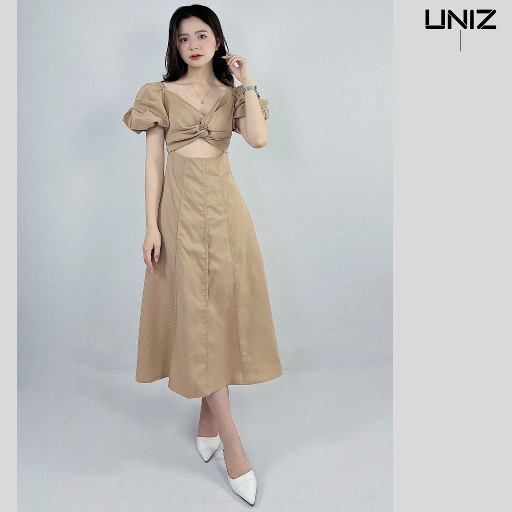 Váy xoắn ngực tay bồng suông dài .dáng thiết kế hở eo chất thô đũi Uniz 1402