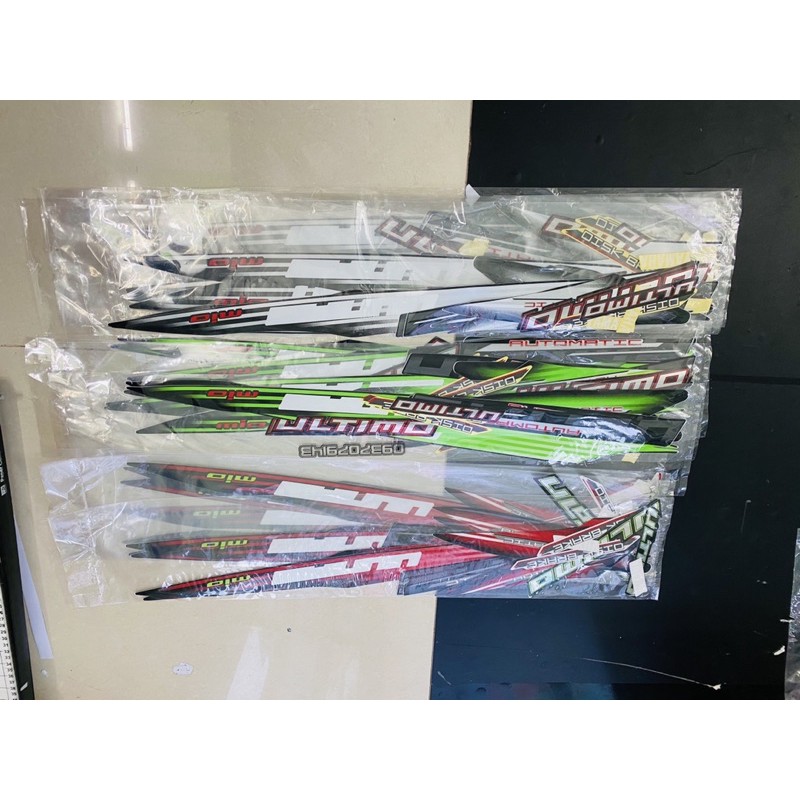 ( Quí khách vui lòng mang ra tiệm cho thợ dán ) Tem mio ultimo 2006 zin lụa chuẩn hàng