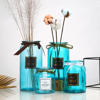 Lọ thủy tinh mini đa sắc màu cắm hoa trang trí nhà cửa.
