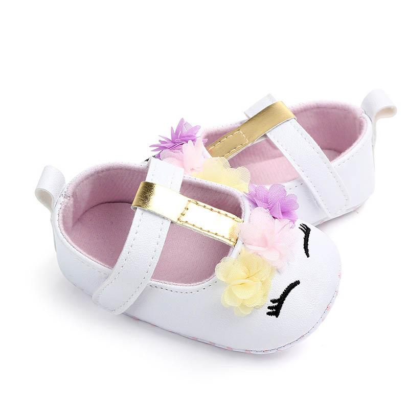 Giày búp bê gắn hoa đế mềm chống trượt cho bé gái từ 0-18 tháng tuổi