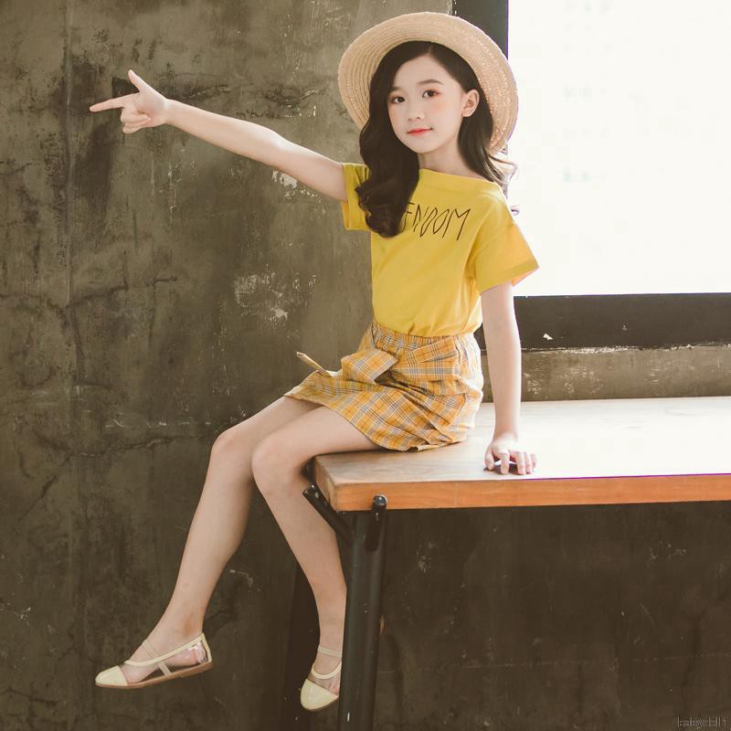 Set áo thun ngắn tay + chân váy caro cho bé gái