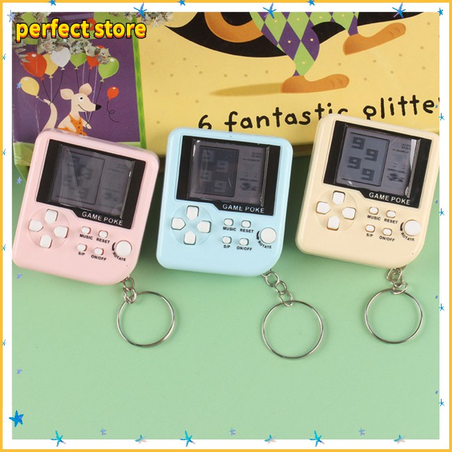 Máy Chơi Game Mini Mang Tính Hoài Niệm Cầm Tay Bỏ Túi Có Gắn Móc Chìa Khóa Trang Trí Xe Hơi Nhiều Màu Khác Nhau