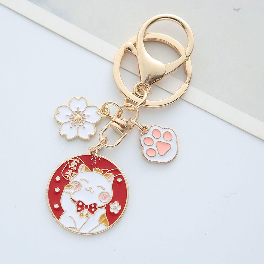 Móc Khóa Hình Mèo AUGUSTINE Và Hoa Dễ Thương