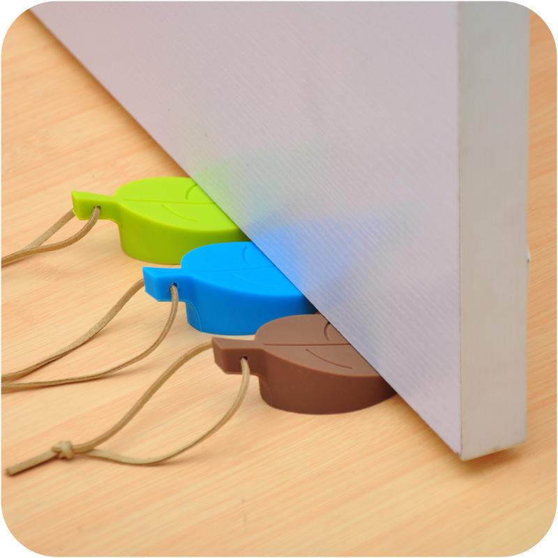 Chặn cửa silicone hình chiếc lá giúp cho chặn cửa an toàn chống va đập, kẹp tay