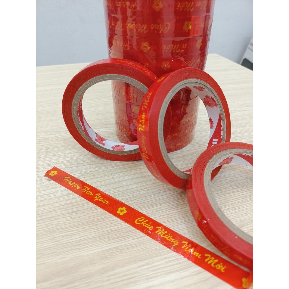 Băng keo in chữ CHÚC MỪNG NĂM MỚI kích thước 15mm x 54m