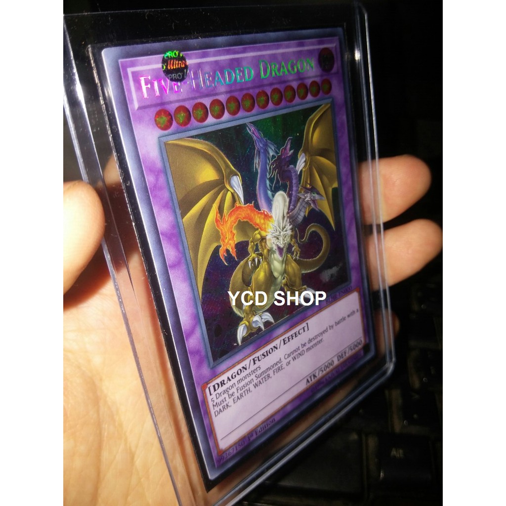 Điều gì khiến Yugioh trở thành một tựa game thẻ bài đẳng cấp? Hiện tại, bạn có thể tìm thấy thẻ bài chính hãng Rồng 5 đầu Five-Headed Dragon-Secret và chiêm ngưỡng hình ảnh đẹp mắt về loài rồng huyền thoại này - một trong những chiến binh mạnh mẽ và bá đạo nhất trong trò chơi.