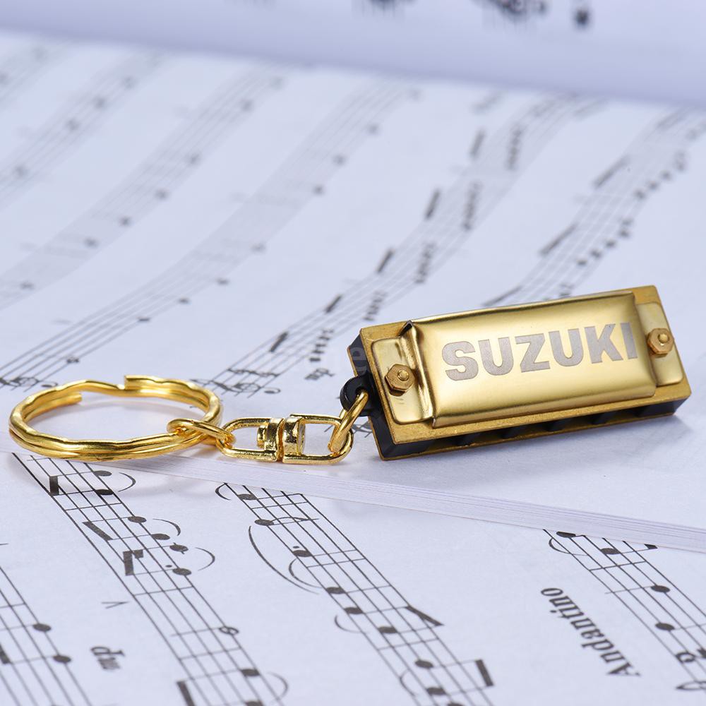 Kèn Harmonica mini 10 tông 5 lỗ phím C có gắn móc khóa logo Suzuki màu vàng kim