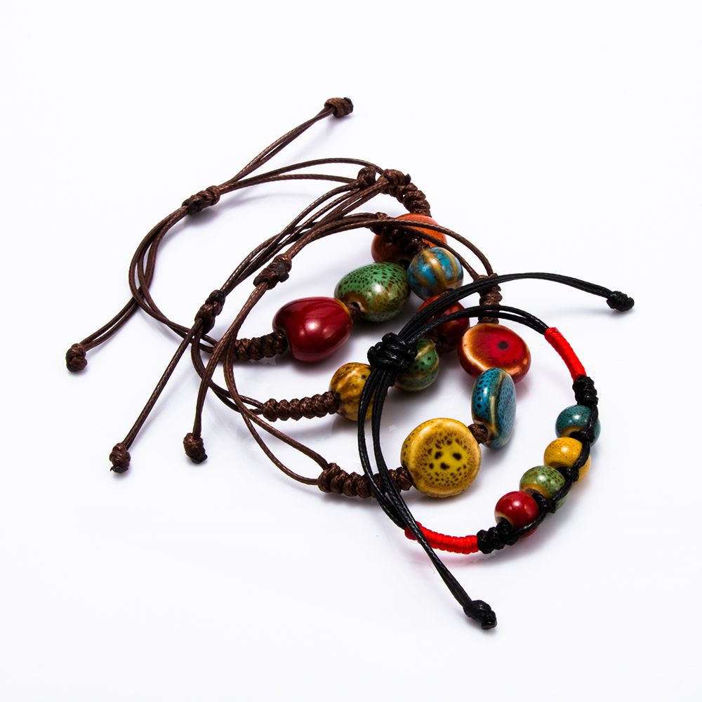 Vòng Đeo Tay Kết Hạt Sứ Hình Chiếc Lá Cho Nam Và Nữ