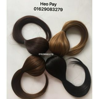 Combo tóc mái phồng + búi tròn