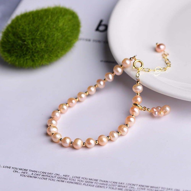 Vòng tay ngọc trai 7ly màu cam mix bi - NT41 - Ngọc Trai Trường Thịnh