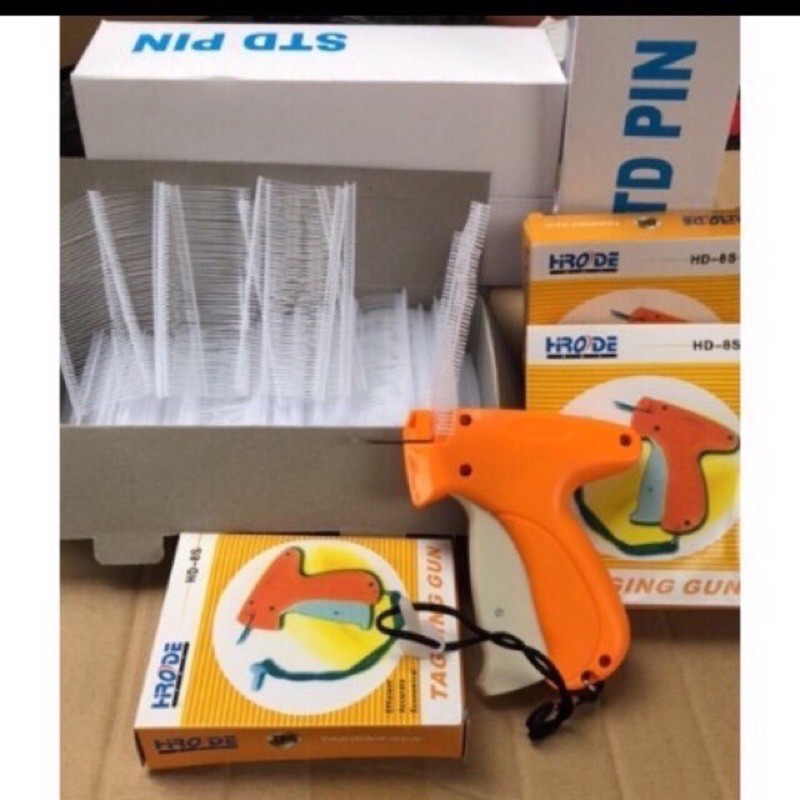 Dụng cụ bắn tag mác quần áo gồm 1 dụng cụ gắn tag và 5000 dây nhựa pc.Shop bán sỉ lẻ.