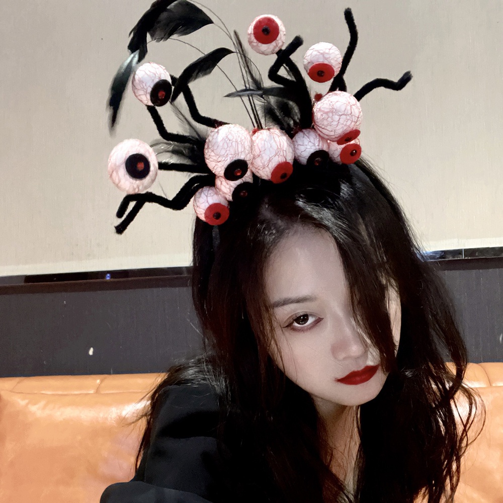 Cài Tóc Hình Đôi Mắt Kinh Dị Đính Lông Vũ Đen Hóa Trang Halloween Cho Người Lớn Và Trẻ Em