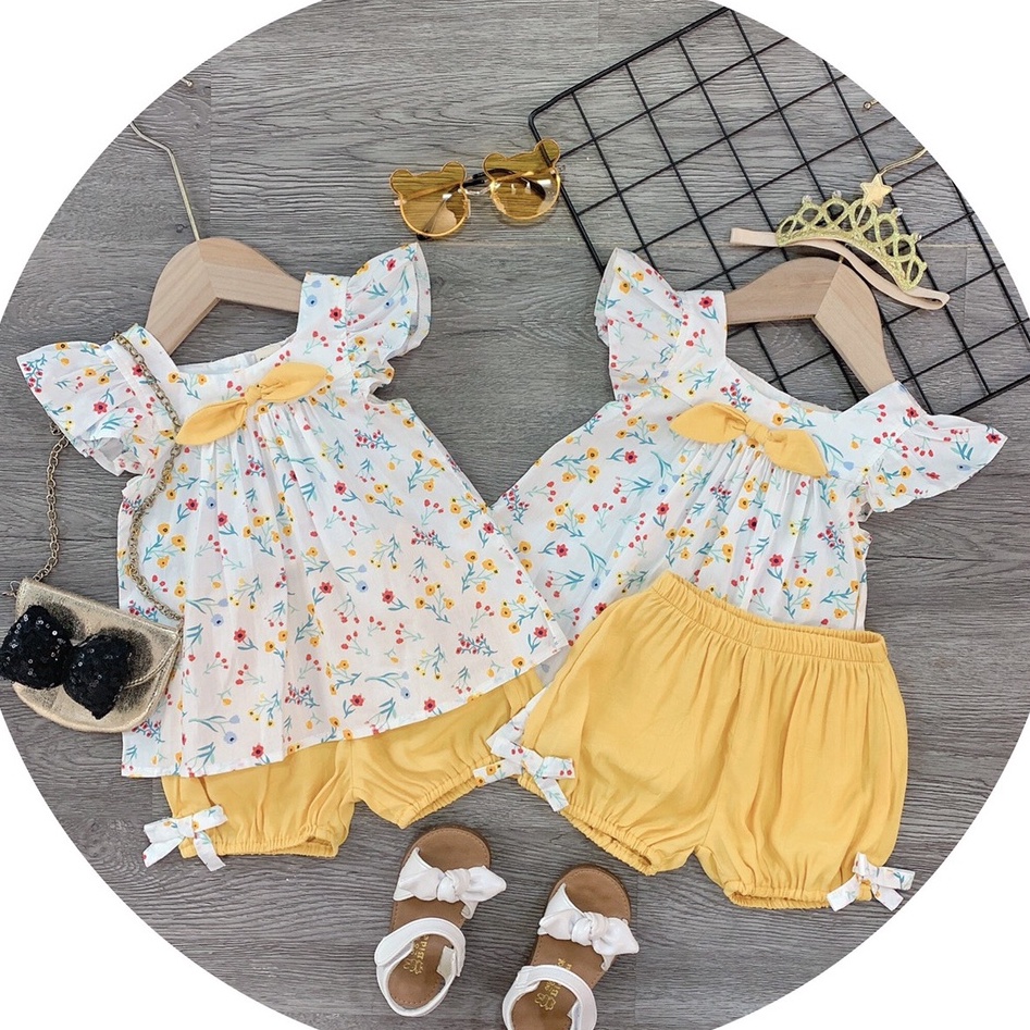 Bộ Quần Áo Bé Gái Chuột Lắc Store Chất Thô Đũi Mềm Mại Kiểu Hoa Nhí Tay Con Nơ Vàng Cho Bé Gái Từ 8Kg Đến 20Kg