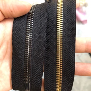 Dây kéo 2 chiều răng 5 (không gồm đầu) gắn túi xách 75k/m