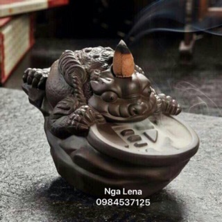 Thác khói trầm hương cóc ngậm tiền