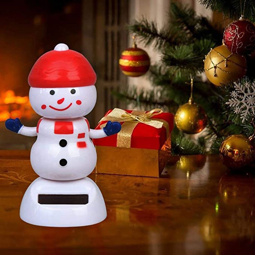 Búp bê người tuyết lắc đầu dùng năng lượng mặt trời trang trí xe hơi