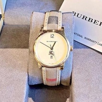 (Thẻ bảo hành 12 tháng) (burberry nữ) Đồng hồ nữ Burberry dây da cao cáp, kẻ caro tính tế, thẻ bảo hành 12 tháng MTP-STO