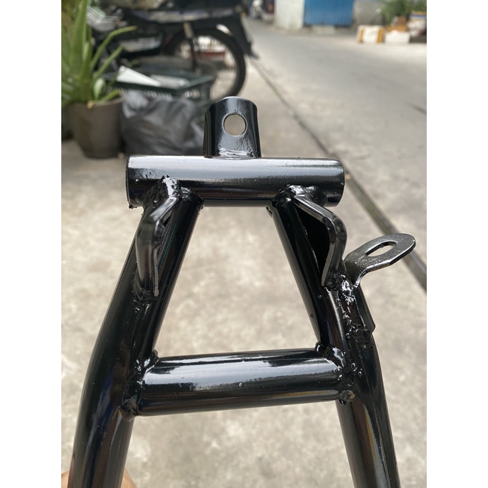 CHÂN CHỐNG ĐỨNG XE DREAM