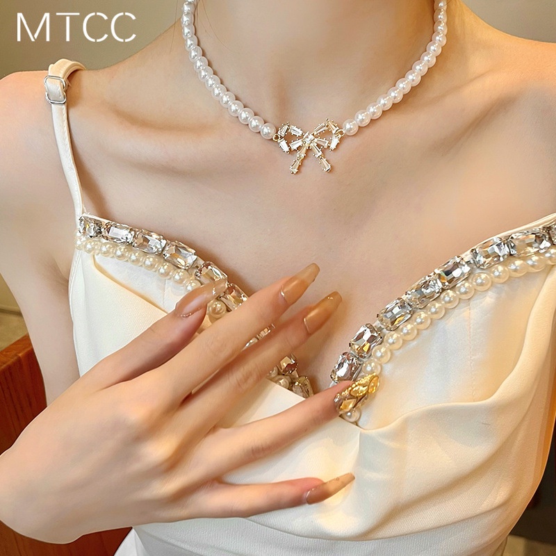 dây chuyền choker nữ chuỗi ngọc đính nơ sáng lấp lánh