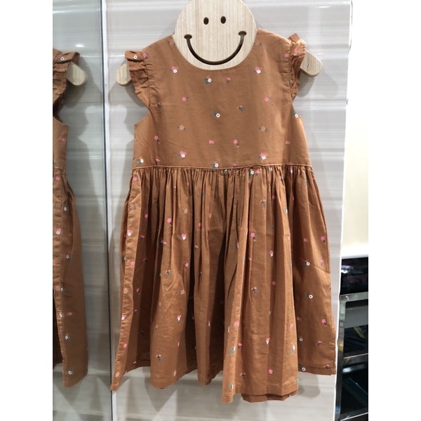 Đầm hoa sát cánh bé gái HM