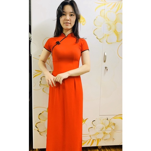 Bộ áo dài đỏ tay ngắn viền đen nút tàu