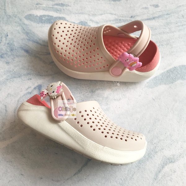 DÉP SỤC TRẺ EM CROCS LITERIDE MÀU HỒNG DA QUAI GẮN NÚT