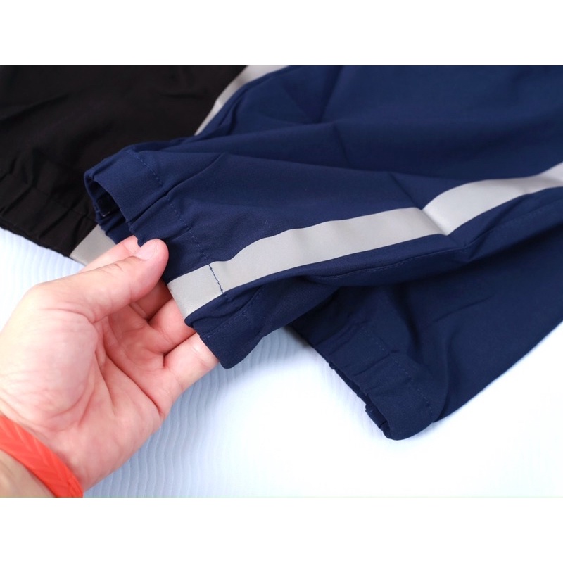 Quần jogger nam thể thao thiết kế sọc phản quang chất vải si dù