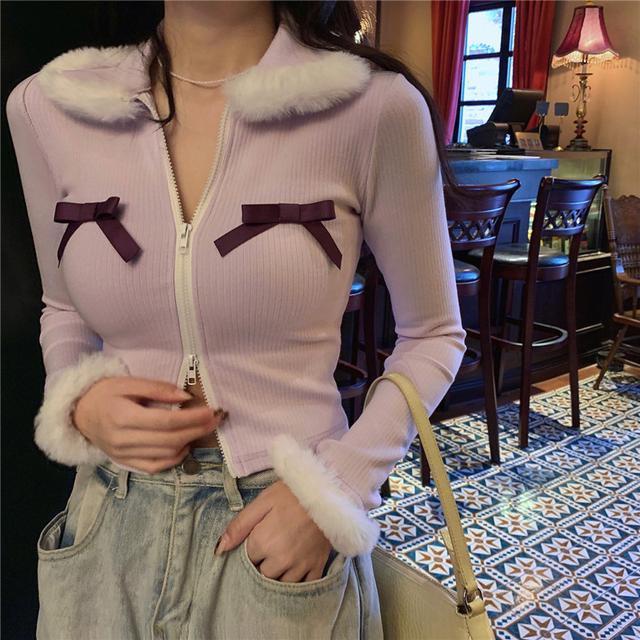 Áo thun dài tay màu tím nhạt phối lông có khóa kéo đính nơ dễ thương thời trang Hàn Quốc cho nữ