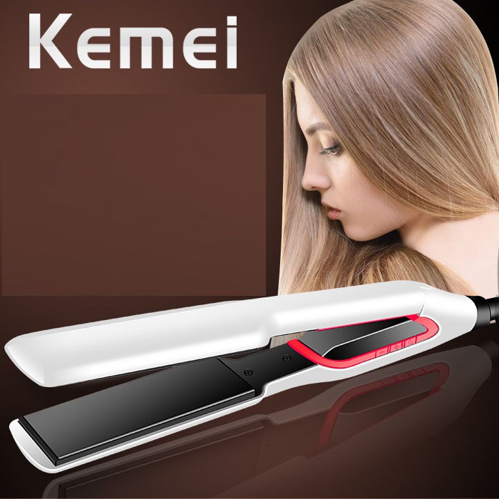 Máy duỗi tóc mini - Kemei KM-957,Phần tỏa nhiệt được sơn tĩnh điện không bong tróc.Thích hợp với mọi loại tóc