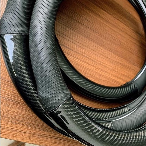 Bọc vô lăng CARBON phối da thoáng khí đủ các hãng xe Toyota-Honda-Hyundai-Mazda-KiA-Ford-Mitshubishi-Chevrolet cao cấp