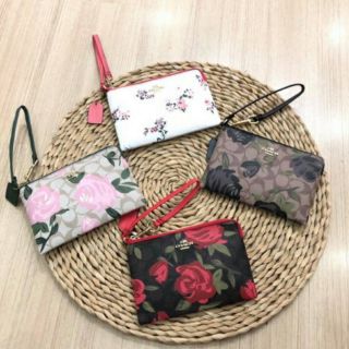 Ví cầm tay Coach hàng chuẩn xuất dư xịn
