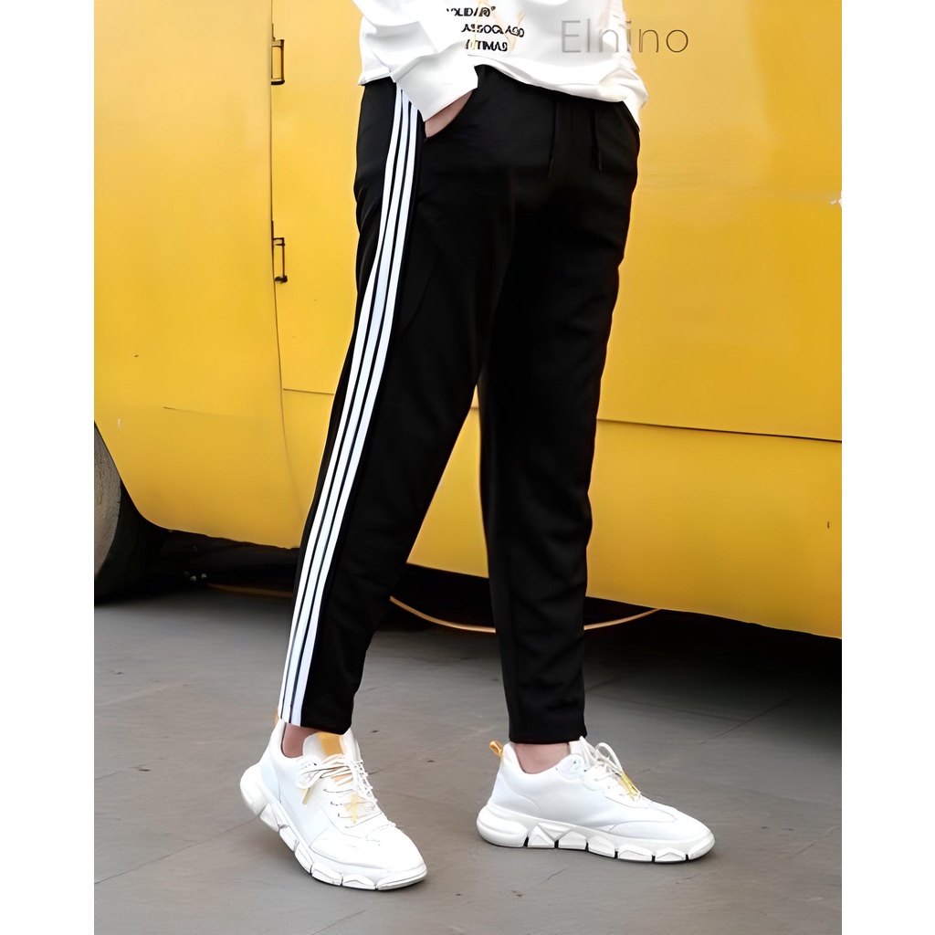 Quần Jogger Nam Nữ phối Sọc ống SUÔNG thun Poly. Phong Cách Thể Dục Thể Thao Năng Động Cá Tính Unisex