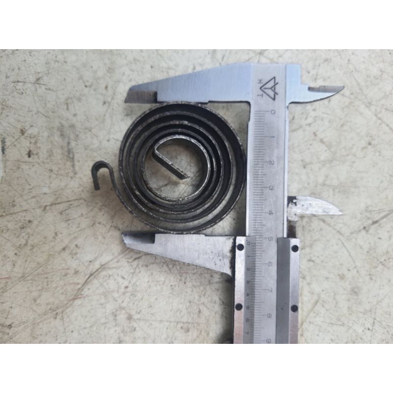 Lò xo máy khoan bàn