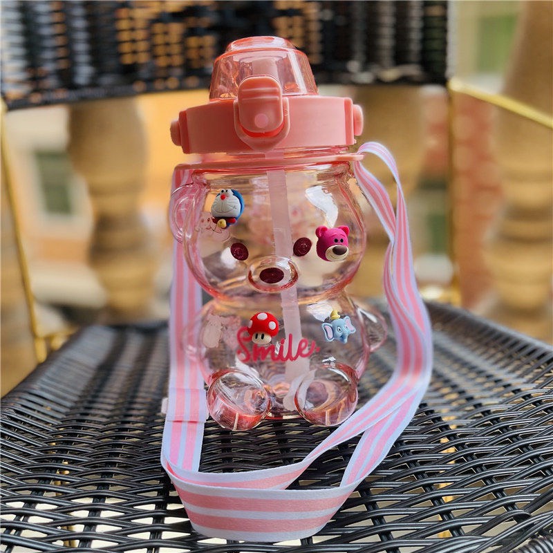 Bình nước nhựa gấu 1000ml kèm tặng hình dán