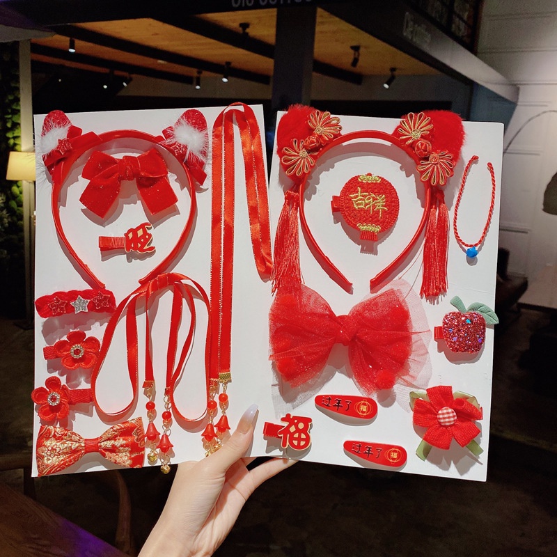 Kẹp tóc nơ đỏ cho trẻ em mới sinh