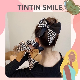 Cột tóc kẻ caro nhà TinTin