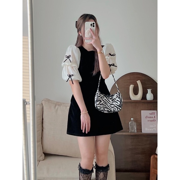 Váy nhung tay voan phồng đính nơ đen