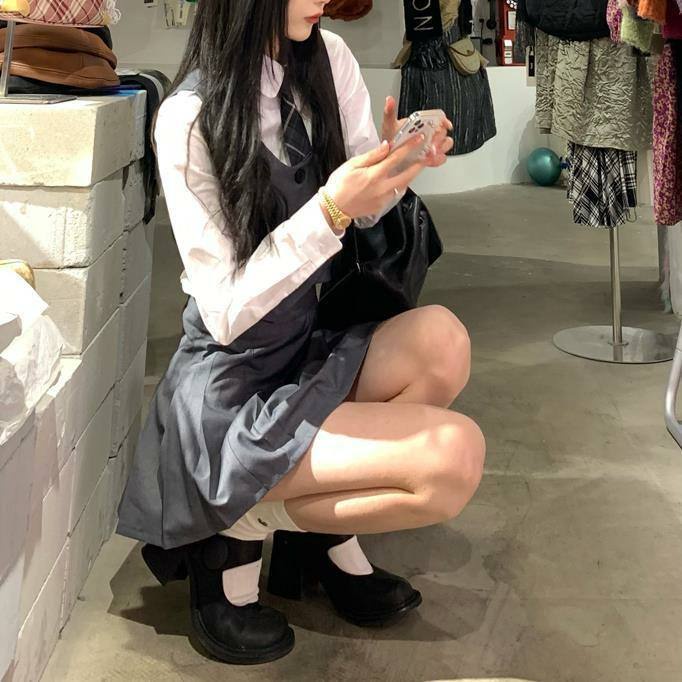 Set áo khoác không tay + áo sơ mi tay dài+ chân váy + cà vạt thời trang cho nữ