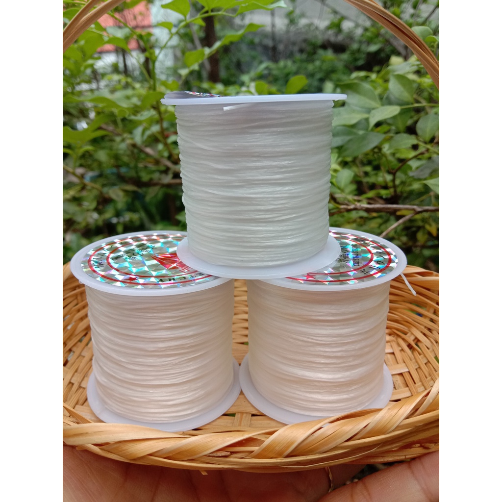 Cuộn dây cước lụa co giãn xâu vòng nguyên liệu làm handmade loại đẹp màu trắng tầm 50 - 60m cuộn