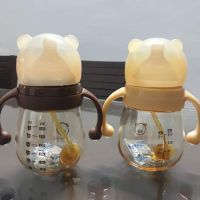 Bình sữa gấu ( tặng 2 núm ti + bộ cọ 5 món )
