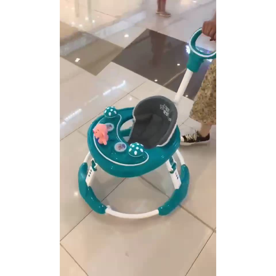 XE TRÒN TẬP ĐI CÓ TAY ĐẨY