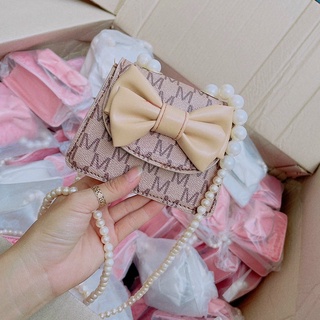 Túi đeo chéo mini nơ dây ngọc